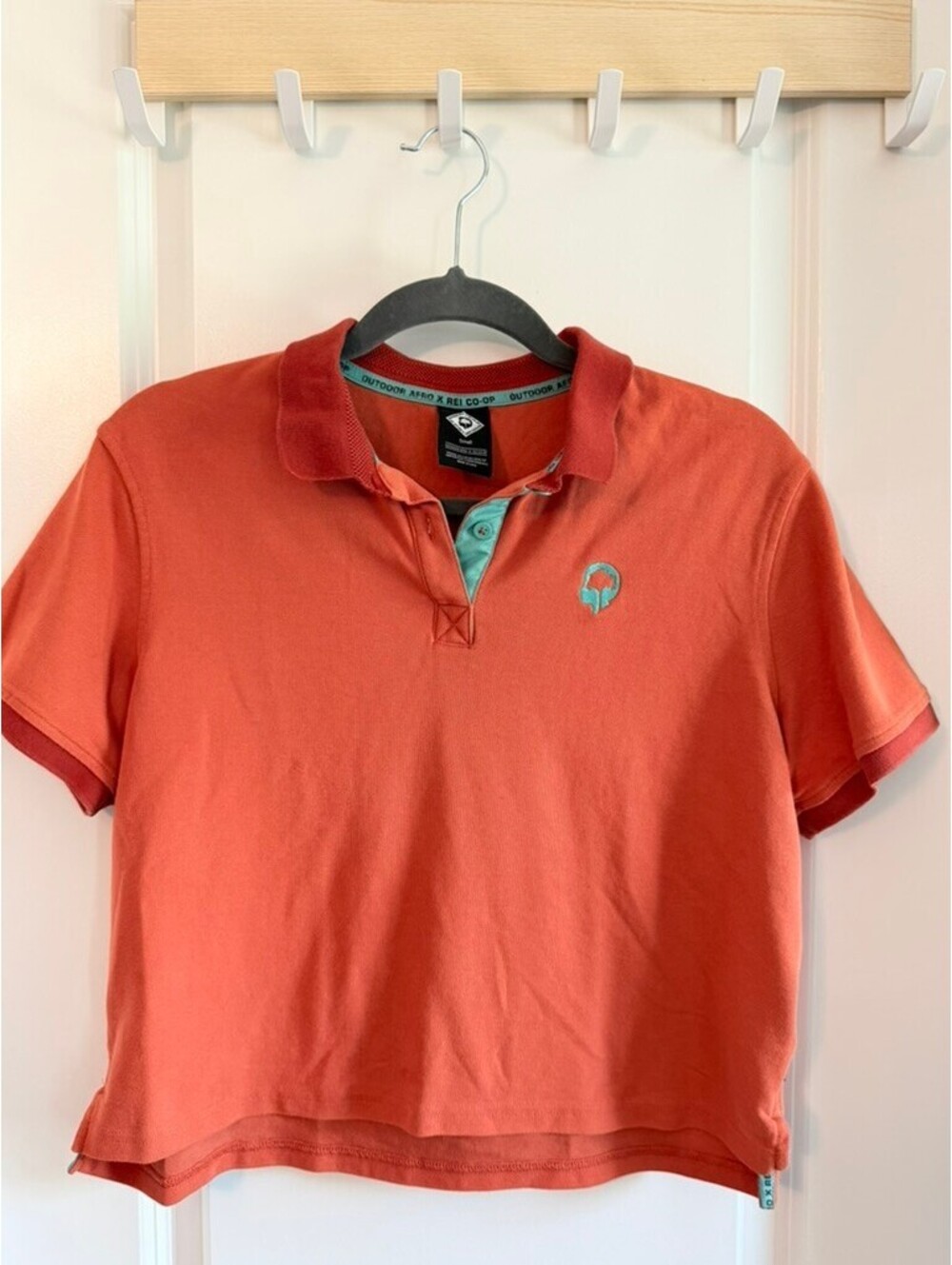 Outdoor Afro x REI Co-op Polo Shirt | Burnt Orange Performance Knit Small